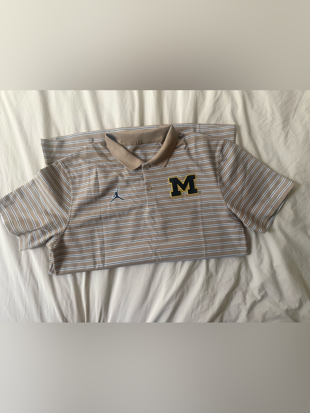 Jordan Tan, White & Navy Striped Polo with Michigan M